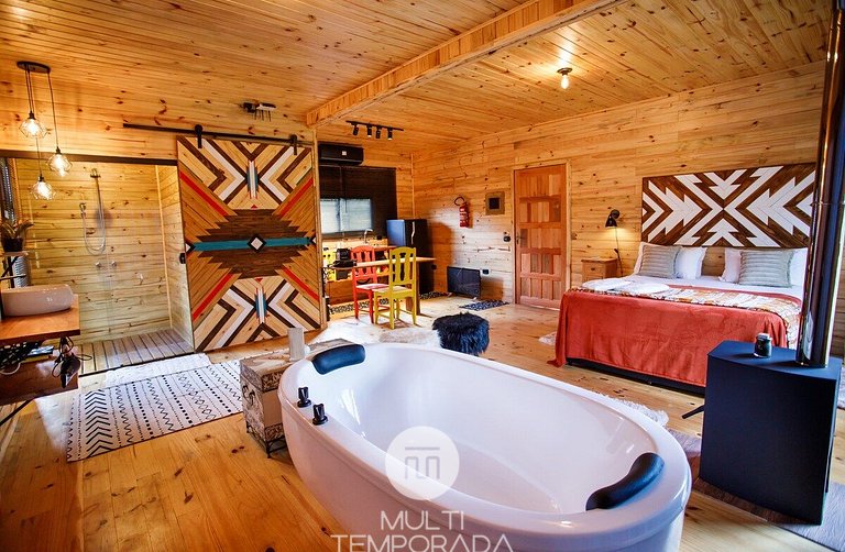 Cabana Sinais: banheira e vista da cama incrível!
