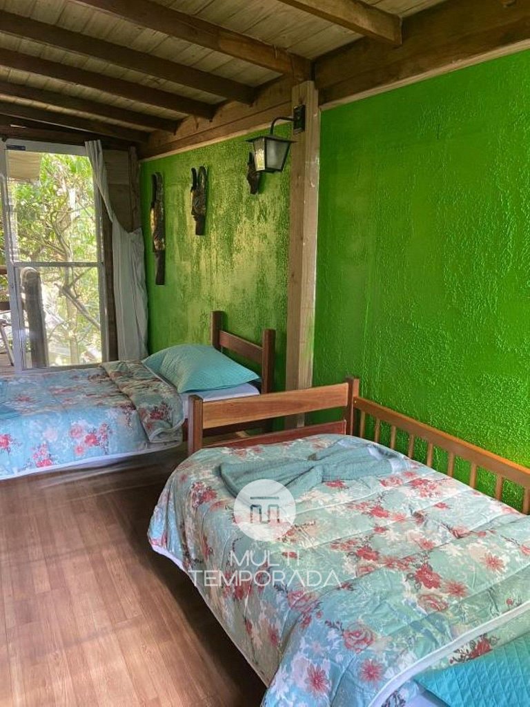 Suíte Papagaio - Essência da Guarda Surf House