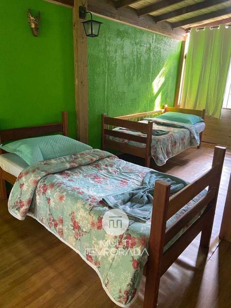 Suíte Papagaio - Essência da Guarda Surf House