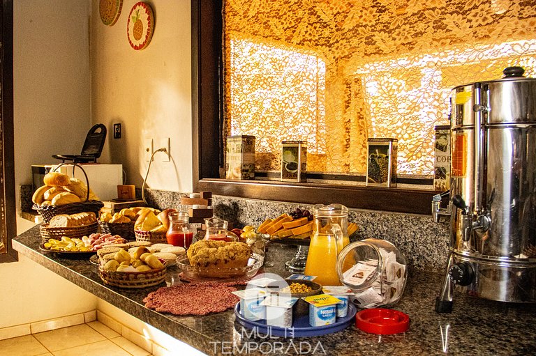 Suíte Ipê amarelo - Pousada Quinta dos Quintais