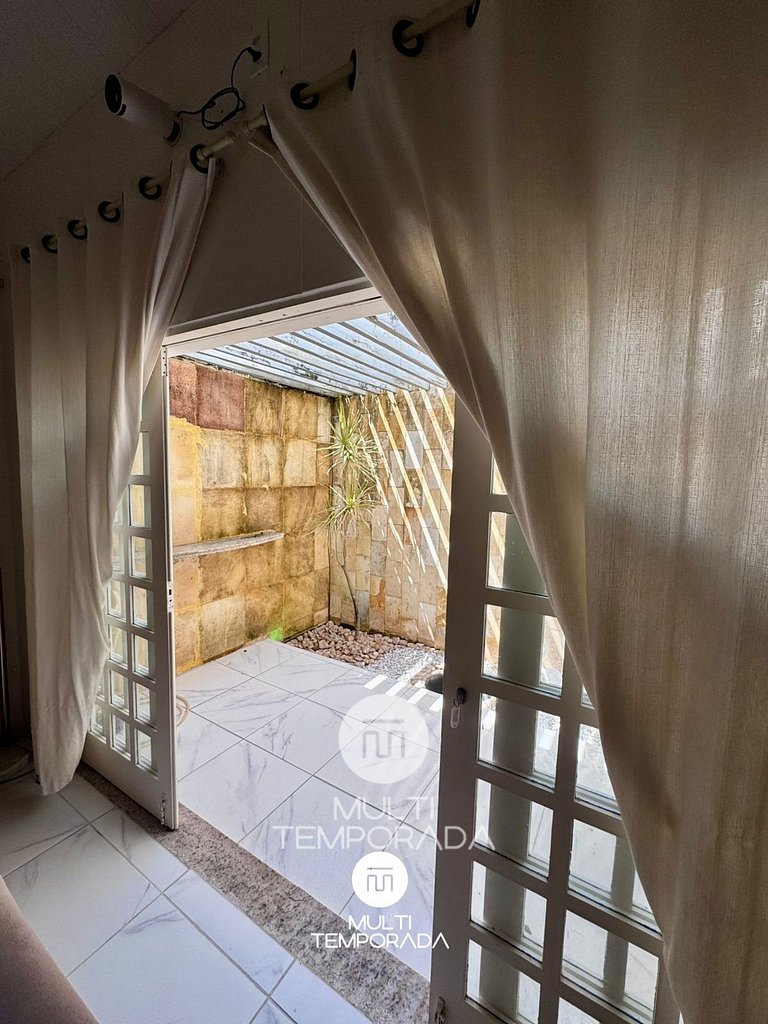 Suíte Quadrupla Térrea - Pousada On the Beach