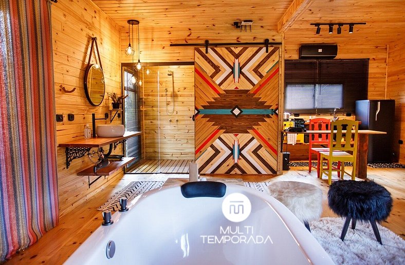 Sianis Cabin: Incredible bathtub and view from the bed!